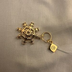 Chanel Elegant Gold Snowflake Charm (will gift a Monet 16" chain.)